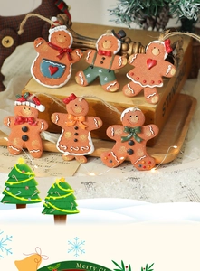 Detailed view of 6-piece resin gingerbread man ornaments with rustic twine hangers