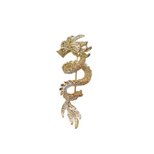 Exquisite gold Chinese dragon brooch encrusted with sparkling crystals for elegant wear
