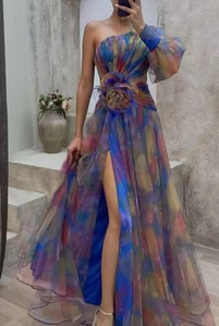 Detail of floral one shoulder dress featuring waist 3D flower and high slit design