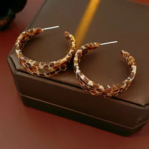 Retro leopard print C-shape acetate earrings with silver needle on jewelry box