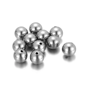 Perles rondes en acier inoxydable poli avec trou pour la création de bijoux DIY