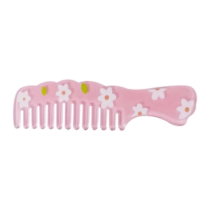 Pink comb hair clip with cute floral patterns for a Korean minimalist aesthetic