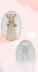 Detail view of caramel and snow white long plush ferret stuffed animals with soft fur