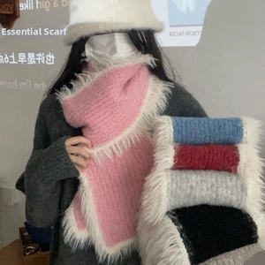 Detail of plush knitted scarves in multiple colors with elegant white fringe accents