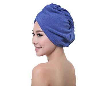 Blue microfiber hair drying towel cap for women showing high water absorption and comfort