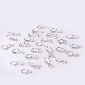 8mm silver paved zircon initial letter pendant nose rings on white background