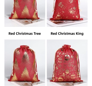 Detail of red burlap Christmas drawstring bags with festive gold foil stamped patterns