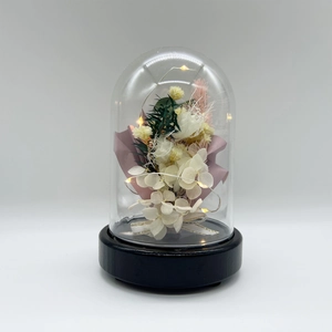 Detailed view of eternal flower lamp with warm LED lights and preserved hydrangea