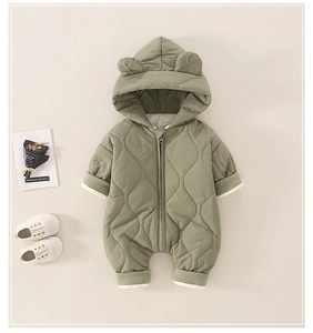 Detailed view of sage green quilted baby jumpsuit with cute bear ears and front zipper