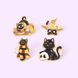 Detailed set of four Halloween black cat enamel pins on a soft purple background