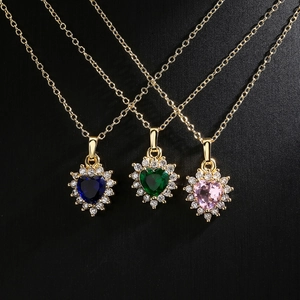 Three heart-shaped 18K gold plated necklaces with blue, green, and pink zircon stones