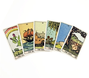 Macro view of six fan-shaped Sea Soul Journey Oracle cards with classic Lenormand illustrations