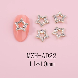 Detailed view of gold 3D star nail charm with crystals and 11x10mm size markings