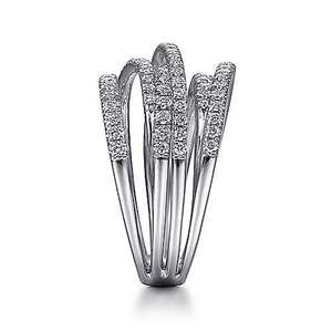 Macro detail of silver-tone multi-layer intertwined ring with pavé-set clear zircons