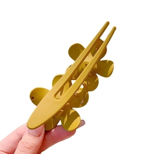 Floral matte yellow hair claw clip for elegant updo hairstyles in high quality resin