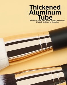 Detailed macro of a thickened golden aluminum ferrule on a professional makeup brush