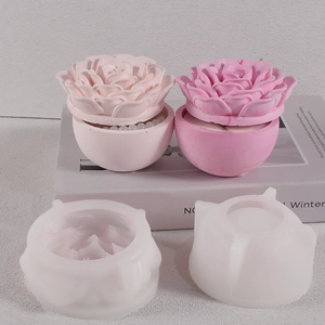 Detail of DIY rose flower silicone mold and finished plaster bowls with realistic petals