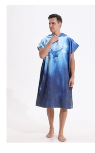 Close-up of microfiber beach poncho featuring blue ocean ray print and hood detail