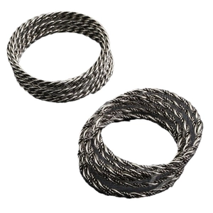 Vintage silver twisted rope ring set in punk style with detailed braided metal texture