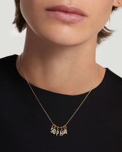 Detail of custom gold-plated S925 silver necklace with SOPHIA lettering and pave zircon stones