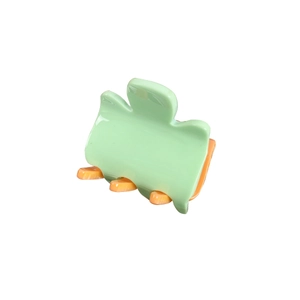 Chic mint green and orange two-tone acrylic hair claw clip with glossy finish