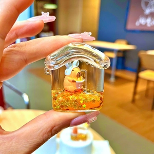 Cute Capybara house-shaped liquid quicksand keychain with orange oil and gold sequins