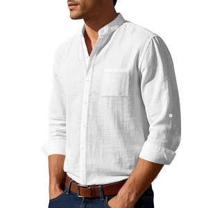 Macro detail of white linen shirt showing mandarin collar and chest pocket texture