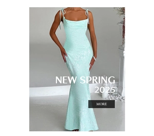 Detail of mint green jacquard floral fabric on an elegant mermaid cocktail dress