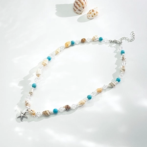 Collier bohème avec pendentif étoile de mer, coquillages naturels et perles turquoise
