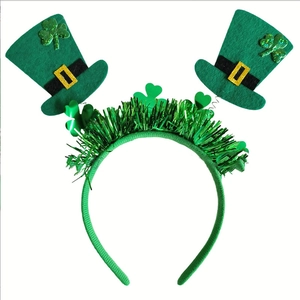 St. Patrick's Day headband with green mini top hats and clover glitter tinsel fringe