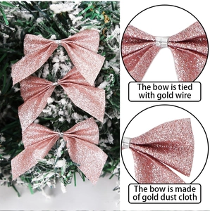 Detailed views of pink Christmas bows showing glitter texture and wire attachment on trees