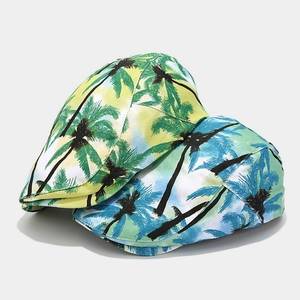 Detail view of retro tropical palm tree print short-brim duckbill caps in vibrant colors