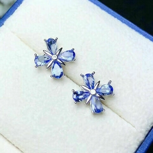 Blue flower stud earrings with teardrop zircon petals on a silver metal base