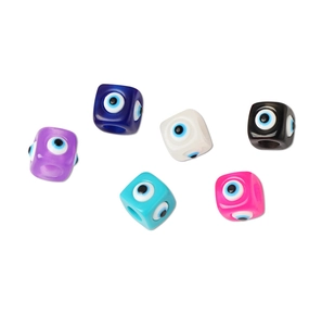 Macro shot of colorful resin square evil eye beads for DIY jewelry making and crafts