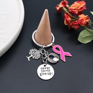 Silver tree of life keychain with pink ribbon and engraved never give up message tag