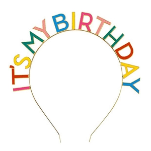 Close-up of golden headband with colorful enamel letters spelling IT'S MY BIRTHDAY