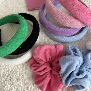 Set of colorful soft terry cloth wide headbands and scrunchies for hair styling