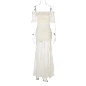 Detail of off-shoulder cream mesh maxi dress with ruching and sheer layered fabric