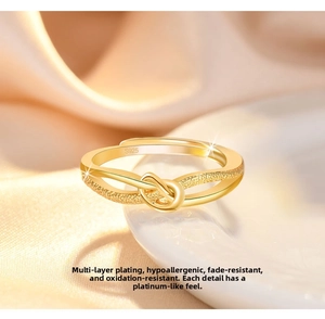 Macro detail of gold-plated S925 silver knot ring featuring textured cross design