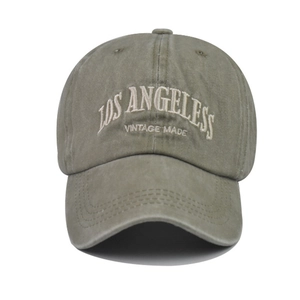 Detail of vintage Los Angeles 3D embroidery on washed cotton army green baseball cap