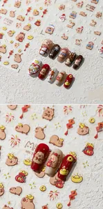 Close-up of Capybara nail stickers with 3D embossed New Year and Christmas festive elements