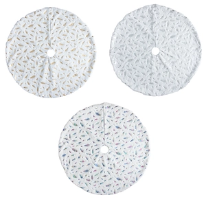 Detail of three white plush Christmas tree skirts with gold, silver and colorful feathers