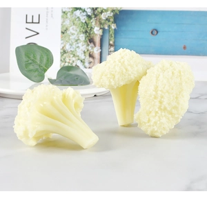 Detailed view of realistic PVC cauliflower models with natural textures on marble surface