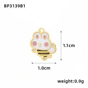 Detail of a cartoon honey bee enamel pendant with dimensions 1.1cm x 1.0cm and 0.9g weight