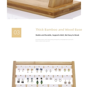 Detail of multi-layer bamboo jewelry rack with thick base and earring cards