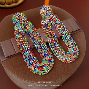 Luxury vintage U-shaped earrings with colorful rhinestones and gold finish tassels