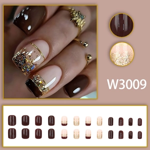 Short square press-on nails in deep coffee and nude pink with gold glitter, model W3009