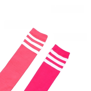 Detailed comparison of striped over-knee socks in rose red and neon red with white stripes