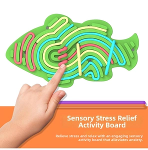 Silicone fish shaped sensory activity board with colorful strings for anxiety relief