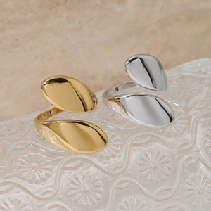 Minimalist adjustable stainless steel wrap rings in gold and silver with teardrop ends